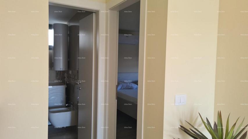 Stan Moderan apartman s parkirnim mjestom i ostavom u bloku F, u blizini Umaga!