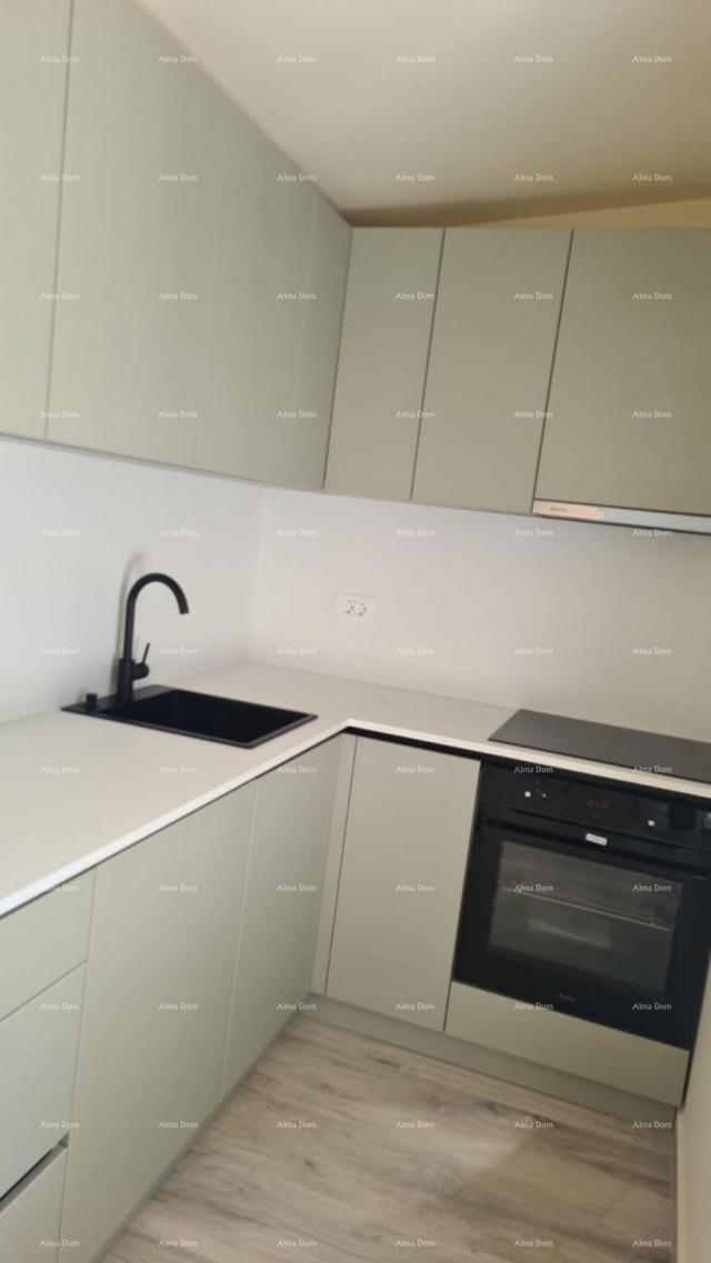 Stan Moderan apartman s parkirnim mjestom i ostavom u bloku F, u blizini Umaga!