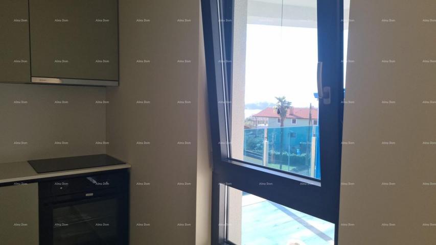 Stan Moderan apartman s parkirnim mjestom i ostavom u bloku F, u blizini Umaga!