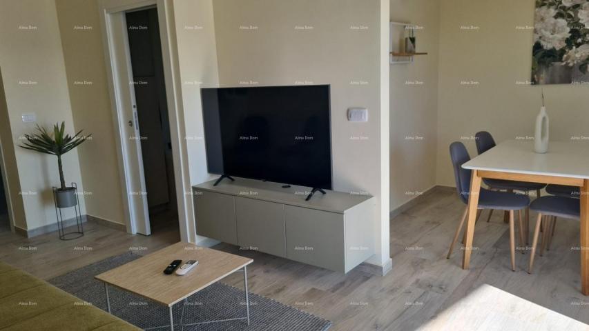 Stan Moderan apartman s parkirnim mjestom i ostavom u bloku F, u blizini Umaga!