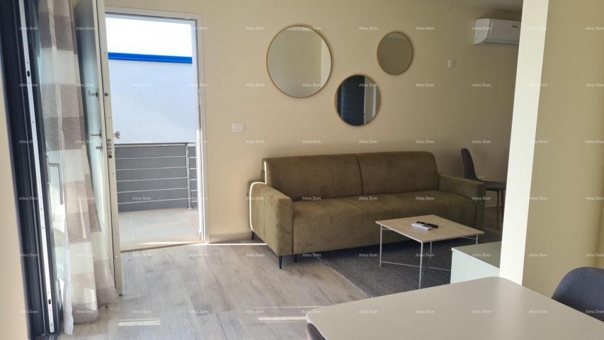 Stan Moderan apartman s parkirnim mjestom i ostavom u bloku F, u blizini Umaga!