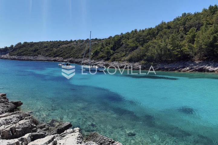 Čara, uvala Žitna, atraktivna parcela prvi red uz more u zoni T2, 7.389 m²