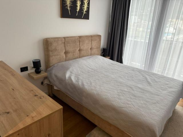 New two-bedroom apartment with sea view in a premium complex in Bar. 