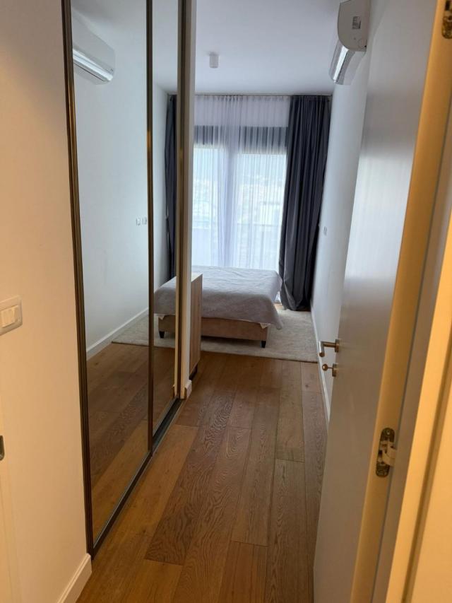 New two-bedroom apartment with sea view in a premium complex in Bar. 
