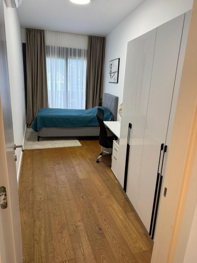 New two-bedroom apartment with sea view in a premium complex in Bar. 