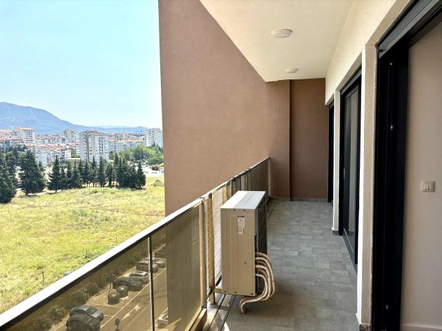 New two-bedroom apartment with sea view in a premium complex in Bar. 