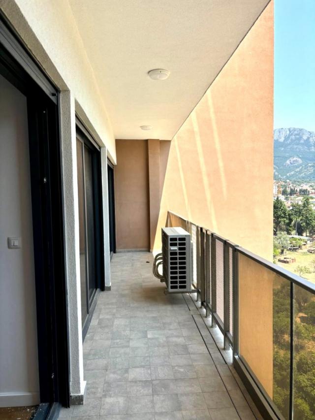 New two-bedroom apartment with sea view in a premium complex in Bar. 