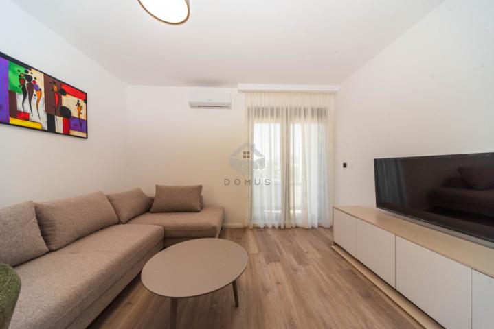 Dvosoban nov stan 64m2 + parking, Zabjelo - Podgorica