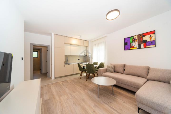 Dvosoban nov stan 64m2 + parking, Zabjelo - Podgorica