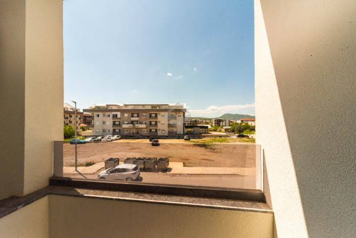 Dvosoban nov stan 64m2 + parking, Zabjelo - Podgorica