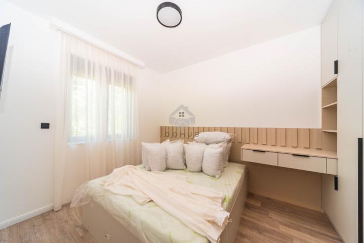 Dvosoban nov stan 64m2 + parking, Zabjelo - Podgorica