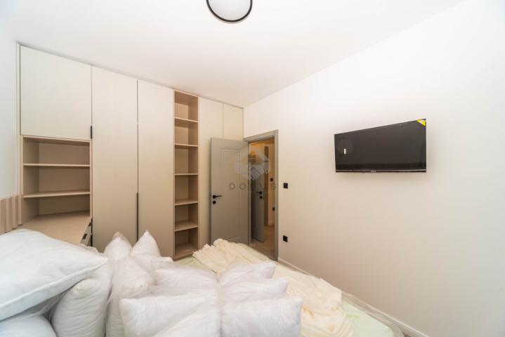 Dvosoban nov stan 64m2 + parking, Zabjelo - Podgorica
