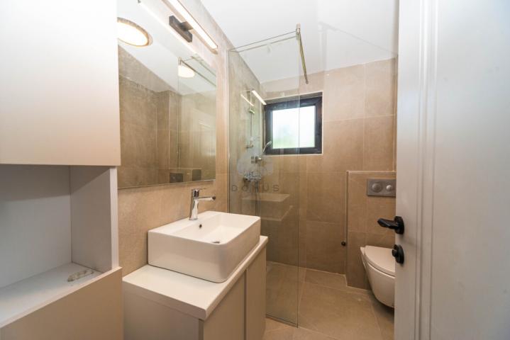 Dvosoban nov stan 64m2 + parking, Zabjelo - Podgorica