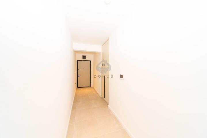 Dvosoban nov stan 64m2 + parking, Zabjelo - Podgorica