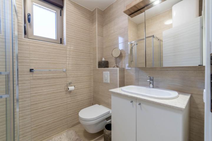 Furnished, two-bedroom apartment with partial sea view, 