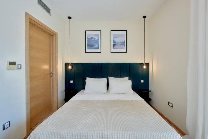 Furnished, two-bedroom apartment with partial sea view, 