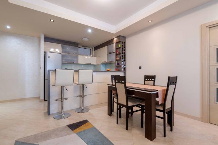 Three-bedroom furnished apartment in the Nivel building, Rozino, Budva