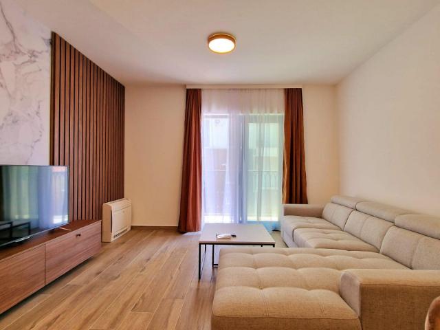 Furnished one-bedroom apartment with garage space in