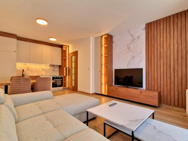 Furnished one-bedroom apartment with garage space in