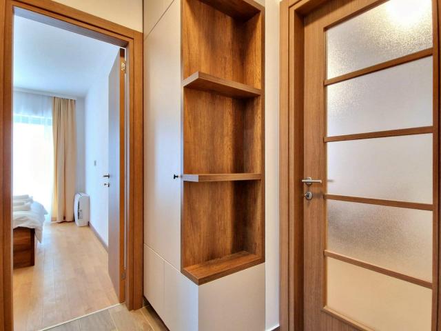 Furnished one-bedroom apartment with garage space in