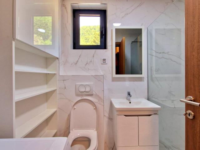 Furnished one-bedroom apartment with garage space in