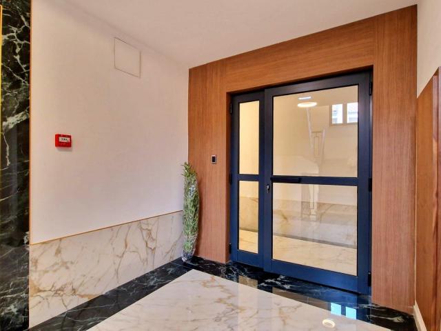 Furnished one-bedroom apartment with garage space in