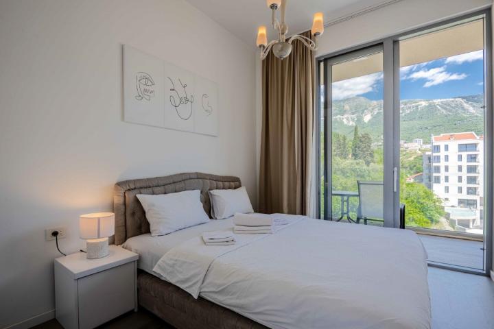 Two-bedroom penthouse with sea and mountain views, Becici