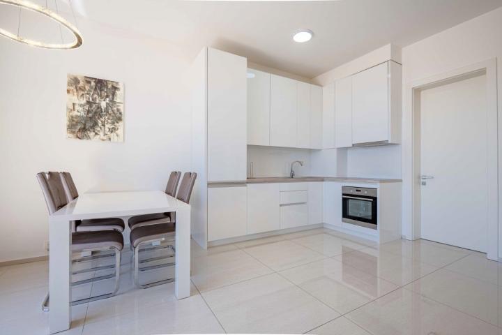 Two-bedroom penthouse with sea and mountain views, Becici