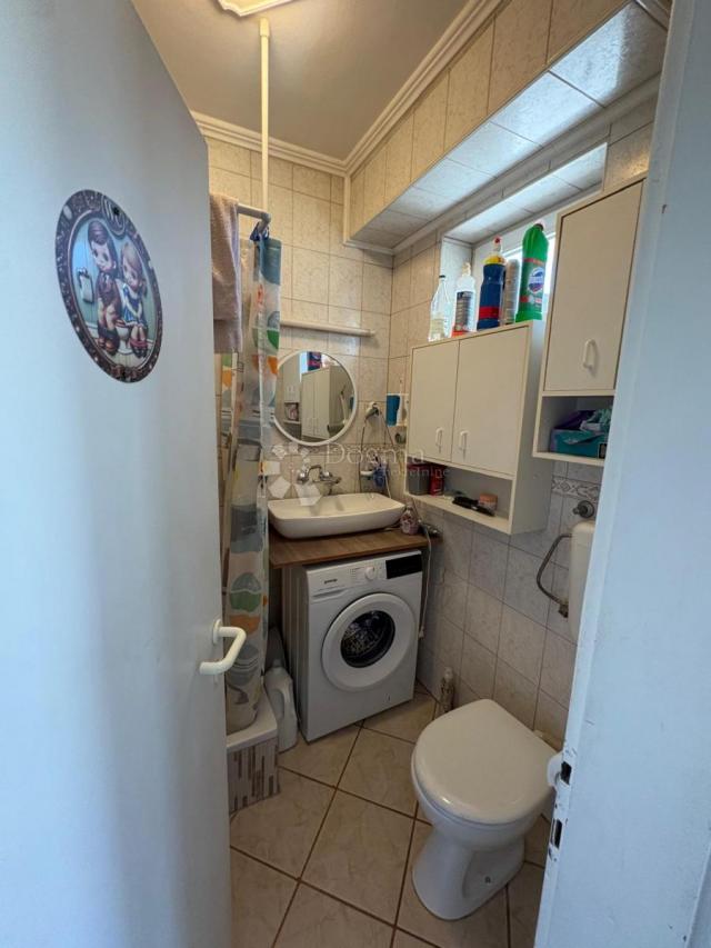 Kuća 648 m² s podrumom i potencijalom za 2 stana