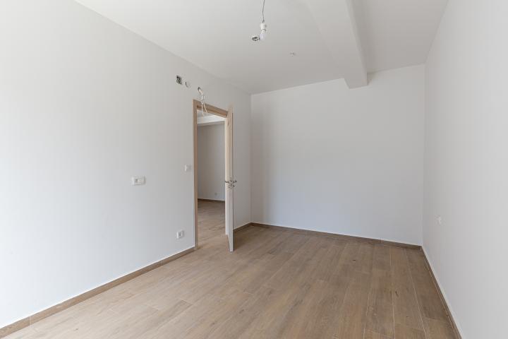 Apartment in Rafailovići, with a total area of 127 m² plus a 13 m² terrace. 