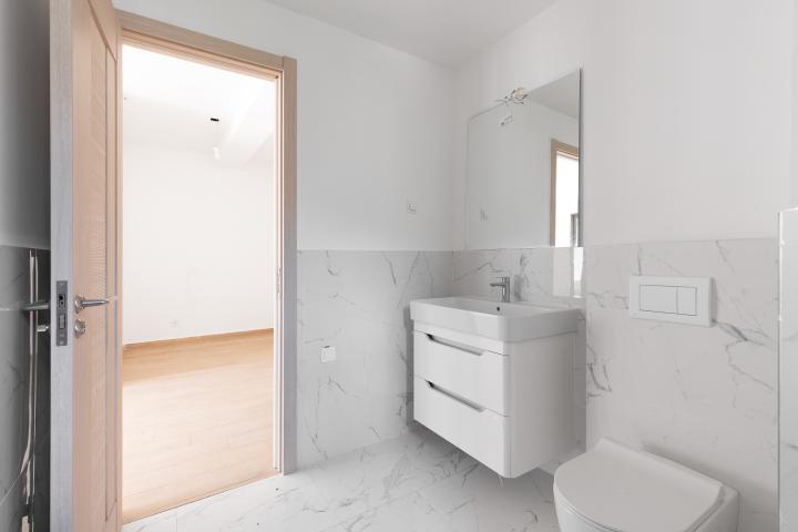 Apartment in Rafailovići, with a total area of 127 m² plus a 13 m² terrace. 