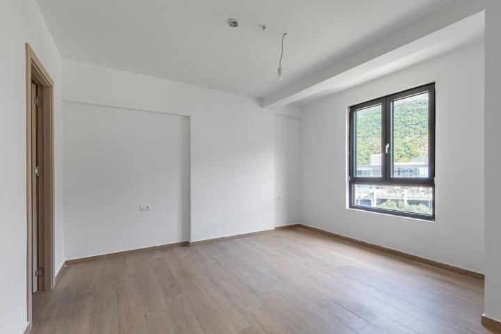 Apartment in Rafailovići, with a total area of 127 m² plus a 13 m² terrace. 