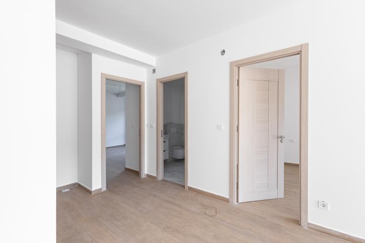 Apartment in Rafailovići, with a total area of 127 m² plus a 13 m² terrace. 