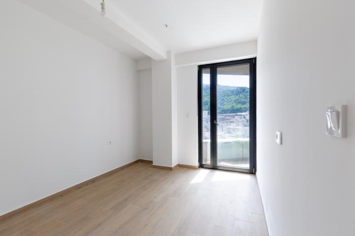 Apartment in Rafailovići, with a total area of 127 m² plus a 13 m² terrace. 