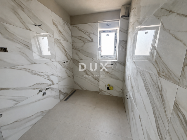 ŠIBENIK, VODICE – Ground floor apartment with a yard in a NEW BUILDING! OPPORTUNITY!
