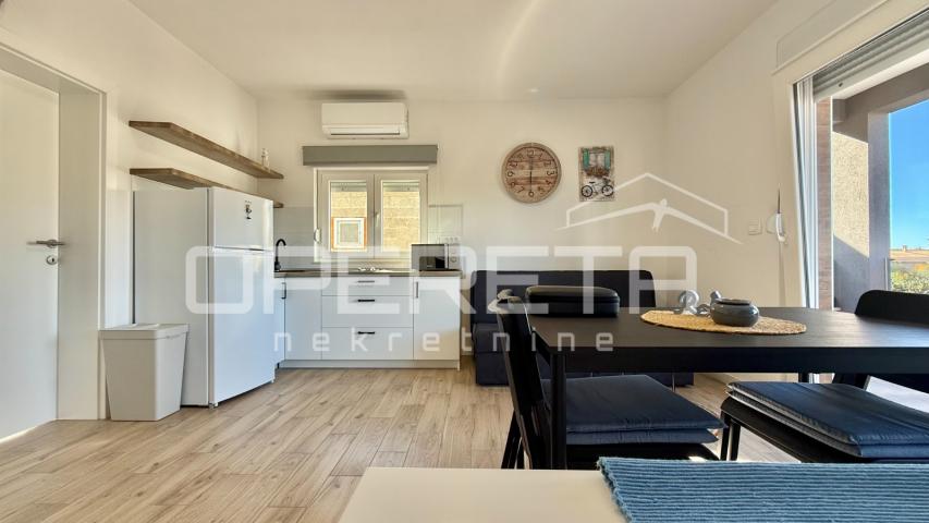 Vir – Samostojeća kuća s četiri moderno uređena apartmana, 170 m²