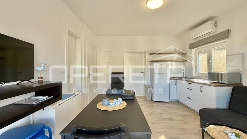Vir – Samostojeća kuća s četiri moderno uređena apartmana, 170 m²