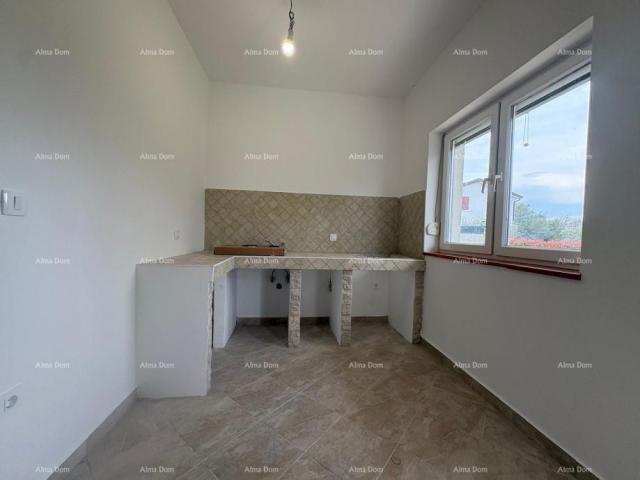 Stan UMAG, stan  sa velikom okućnicom od 1300 m2. Nekretnina ima uporabnu dozvolu. 