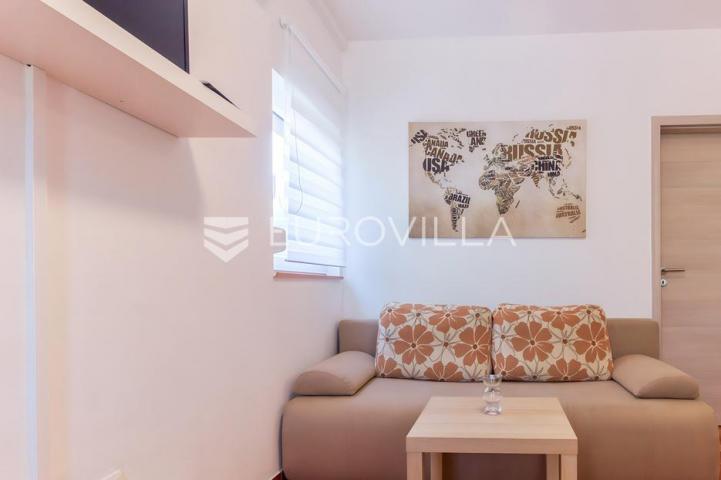 Vir, atraktivna apartmanska kuća s 4 stambene jedinice udaljene 150 m od plaže