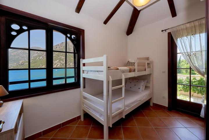 Villa Kostanjica in a waterfront closed-gate resort