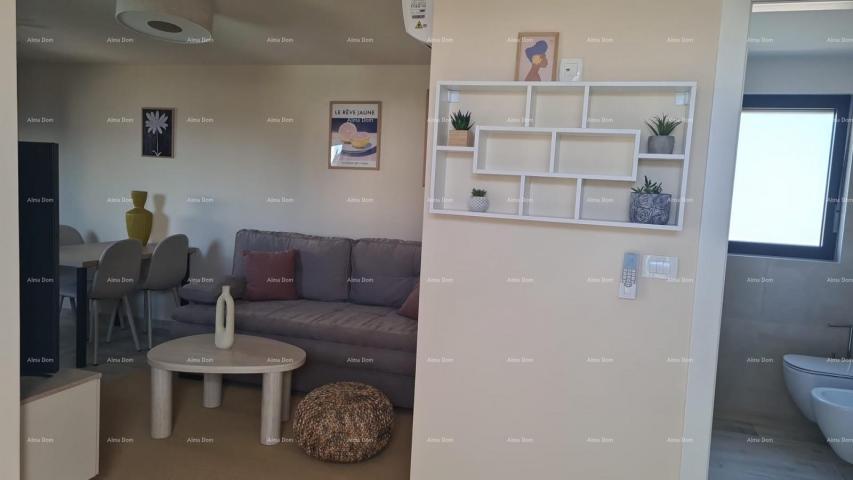 Stan Moderan apartman u bloku E s parkirnim mjestom i spremištem, u blizini Umaga!