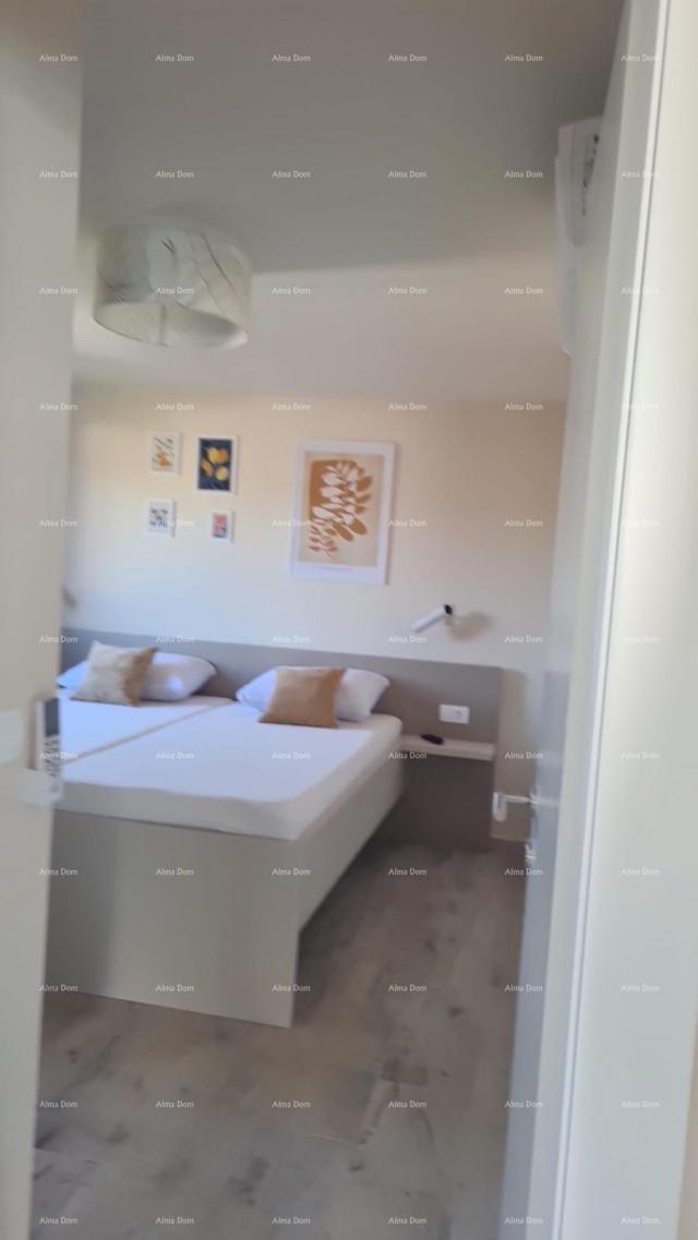 Stan Moderan apartman u bloku E s parkirnim mjestom i spremištem, u blizini Umaga!