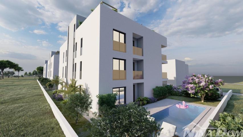 PRIVLAKA DALMACIJA- GRAĐEVINSKO ZEMLJIŠTE S PRAVOMOĆNOM DOZVOLOM ZA APARTMANSKI KOMPLEKS - DRUGI RED