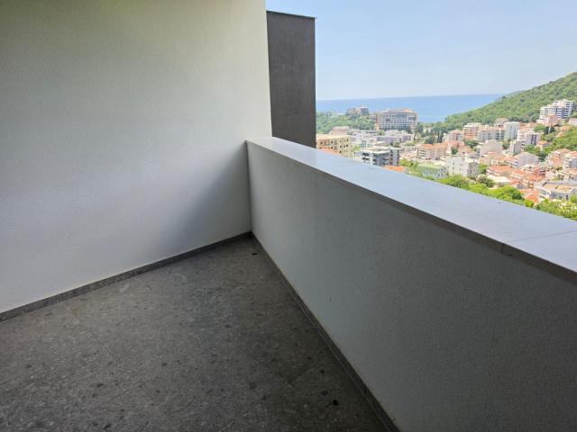 Jednosoban stan 54m2 sa pogledom na more u novom stambenom kompleksu sa bazenom, Becici