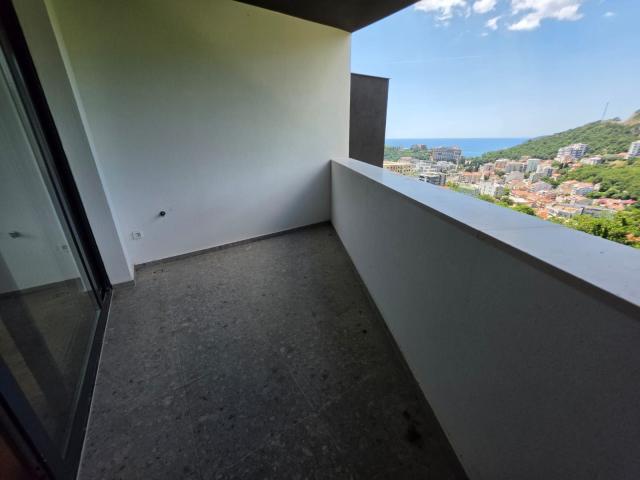 Jednosoban stan 54m2 sa pogledom na more u novom stambenom kompleksu sa bazenom, Becici