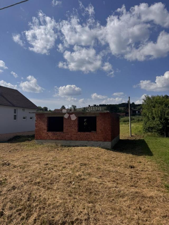 Građevinska parcela s rohbau objektom u Kusonjama
