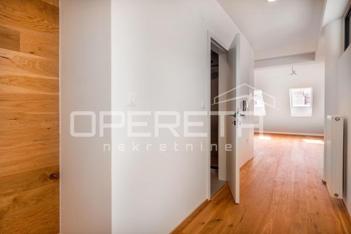 Luksuzni stan, novogradnja u naj užem centru. Parkirno mjesto. Prodaja