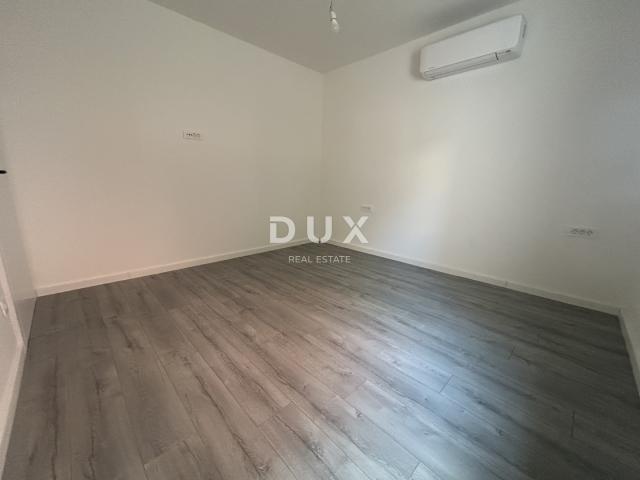 ŠIBENIK, VODICE – Stan u prizemlju sa 121 m² vrta, 2 parkinga, novogradnja