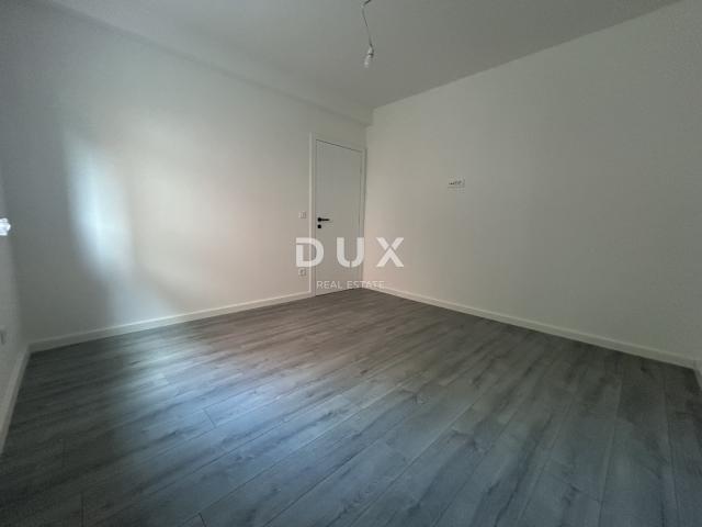 ŠIBENIK, VODICE – Stan u prizemlju sa 121 m² vrta, 2 parkinga, novogradnja