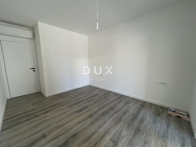 ŠIBENIK, VODICE – Stan u prizemlju sa 121 m² vrta, 2 parkinga, novogradnja